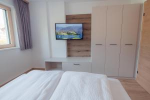 Postel nebo postele na pokoji v ubytování Apart Eder