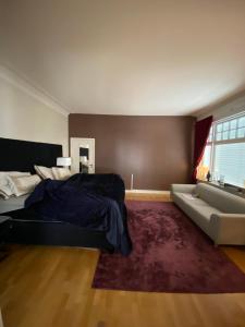 Postel nebo postele na pokoji v ubytování BraMy Apartments The LUX View
