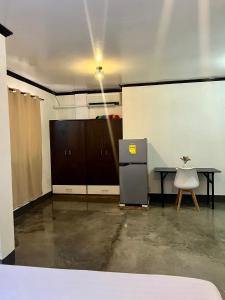 Postel nebo postele na pokoji v ubytování Hidden Gem Siargao