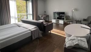 Postel nebo postele na pokoji v ubytování Hotel am Markt