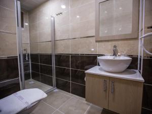 Koupelna v ubytování Payidar Hotel