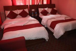 Ένα ή περισσότερα κρεβάτια σε δωμάτιο στο The hotel mountain Taplejung