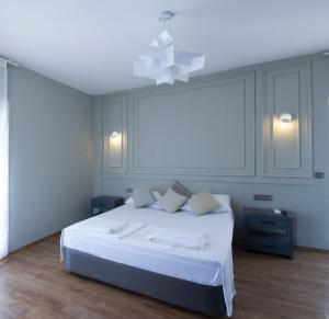 Postel nebo postele na pokoji v ubytování Smart City Bodrum Hotel