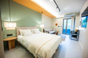 Ein Bett oder Betten in einem Zimmer der Unterkunft Design Rooms - Kvaternik Square