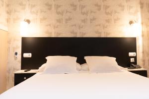 Cama ou camas em um quarto em Hotel Don Diego
