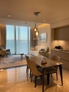 a kitchen and living room with a table and chairs at Best opportunity in emaar in Istanbul