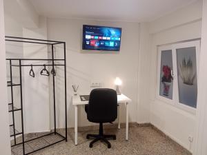 Μια τηλεόραση ή/και κέντρο ψυχαγωγίας στο Private Room Service - Grupo RH Santander