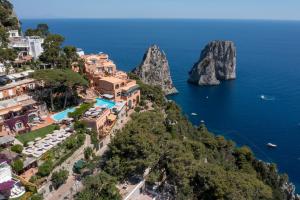 an aerial view of positano on the amalfi coast at Hotel Punta Tragara in Capri