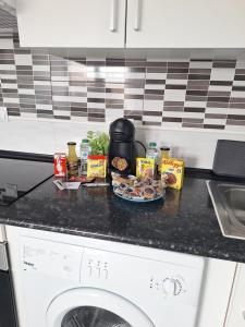 Kuchnia lub aneks kuchenny w obiekcie Casa Zoe - Apartamentos en Suite Budha - Buenas vibras! Edificio #LasNaciones