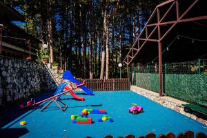 a play area with toys on the ground at Euro Hotel Gradche in Kočani