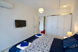 Postel nebo postele na pokoji v ubytování Crystal River Residence Apartments