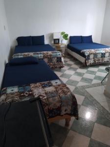Postel nebo postele na pokoji v ubytování Yucatan Vista Inn Guest House