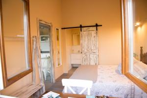 Łóżko lub łóżka w pokoju w obiekcie Apartamentos Nordeste