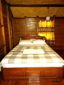 Postel nebo postele na pokoji v ubytování Pai Kiniman Resort