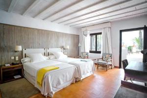 Postel nebo postele na pokoji v ubytování Parador de Mojácar