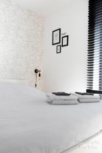Postel nebo postele na pokoji v ubytování Waterfront Nieuwpoort