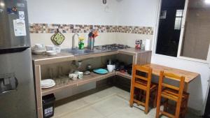 Virtuvė arba virtuvėlė apgyvendinimo įstaigoje Apartaestudio Deluxe del Molino con parking privado