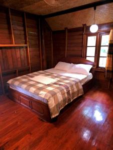 Postel nebo postele na pokoji v ubytování Pai Kiniman Resort