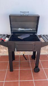 a barbecue grill sitting on top of a floor at Casa Mic&ele in Playa Blanca