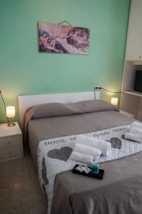 Postel nebo postele na pokoji v ubytování Hotel Cilene