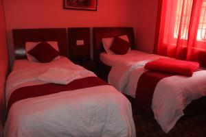 Ένα ή περισσότερα κρεβάτια σε δωμάτιο στο The hotel mountain Taplejung