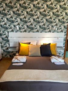 Postel nebo postele na pokoji v ubytování Nonna Felicia B&B