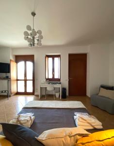 Postel nebo postele na pokoji v ubytování Nonna Felicia B&B