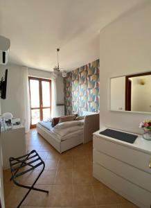 Postel nebo postele na pokoji v ubytování Nonna Felicia B&B