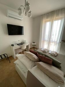 TV a/nebo společenská místnost v ubytování Nonna Felicia B&B