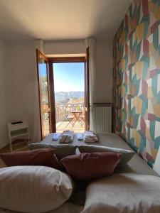 Postel nebo postele na pokoji v ubytování Nonna Felicia B&B