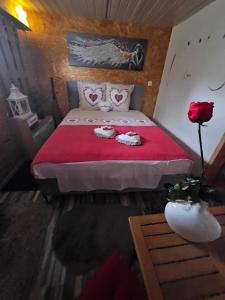 Letto o letti in una camera di Chez Gigi