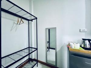 A kitchen or kitchenette at C-Code Resort