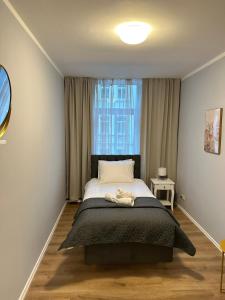 Katil atau katil-katil dalam bilik di Ferienwohnung BX