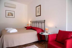 A bed or beds in a room at B&B Al Casalicchio