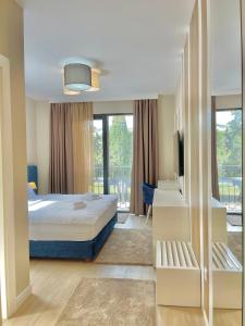 Postel nebo postele na pokoji v ubytování Comfort Apartments Pasha