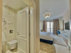 Postel nebo postele na pokoji v ubytování Comfort Apartments Pasha