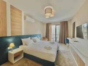 Postel nebo postele na pokoji v ubytování Comfort Apartments Pasha