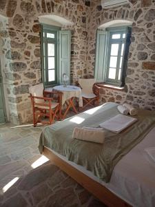 Кровать или кровати в номере Casa Mar on Kantouni Beach