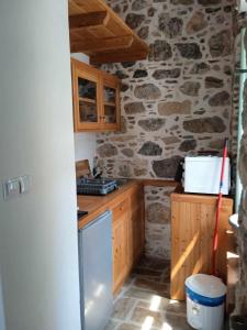 Кухня или мини-кухня в Casa Mar on Kantouni Beach
