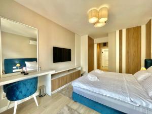 Postel nebo postele na pokoji v ubytování Comfort Apartments Pasha