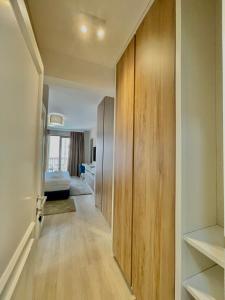 Postel nebo postele na pokoji v ubytování Comfort Apartments Pasha