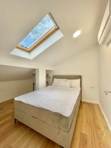 Postel nebo postele na pokoji v ubytování Comfort Apartments Pasha