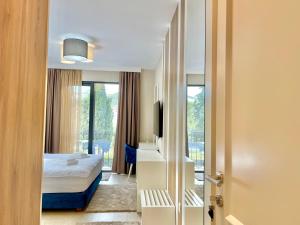 Postel nebo postele na pokoji v ubytování Comfort Apartments Pasha