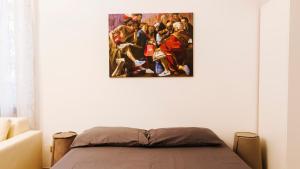 Postel nebo postele na pokoji v ubytování Art Suites Verona