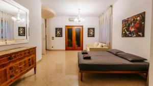 Postel nebo postele na pokoji v ubytování Art Suites Verona