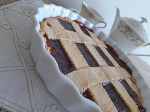 a piece of cake sitting on a plate at Villa Rossi in Polignano a Mare