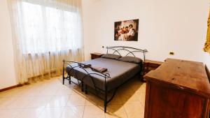 Postel nebo postele na pokoji v ubytování Art Suites Verona