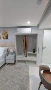 Ванная комната в Studio Praia do jardim 1 205A