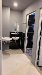 Koupelna v ubytování Bunny - Valentine Hotel - Bui Vien Street