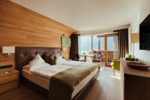 Posteľ alebo postele v izbe v ubytovaní Hotel Grien